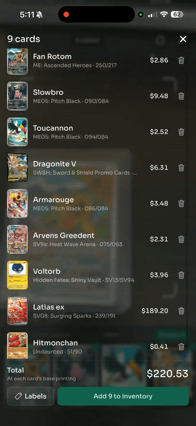 The CardParser review sheet on a phone at the end of a scan: a heading reading '9 cards', then each scanned card with its set and number and price — Fan Rotom $2.86, Slowbro $9.48, Toucannon $2.52, Dragonite V $6.31, Armarouge $3.48, Arvens Greedent $2.31, Voltorb $3.96, Latias ex $189.20, Hitmonchan $0.41 — a total of $220.53 at each card's base printing, and buttons reading 'Labels' and 'Add 9 to inventory'.